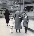 Anne as a little girl with her mother and Margot