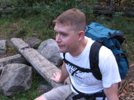 Man sitting on a bench.